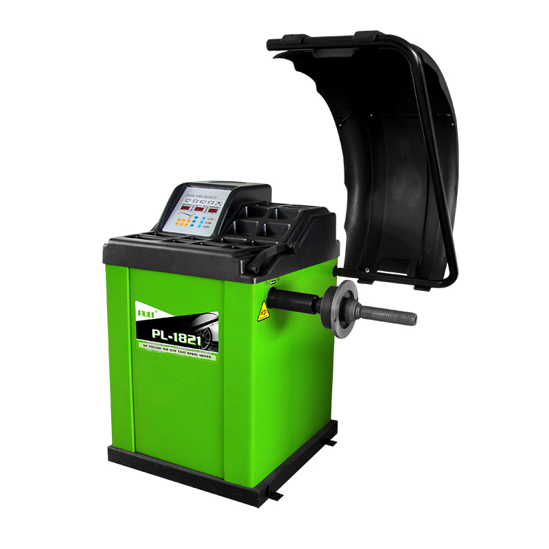 PL-1821 Self-Calibrating Computer Wheel Balancer 1 PL-1821 Self-Calibrating Computer Wheel Balancer